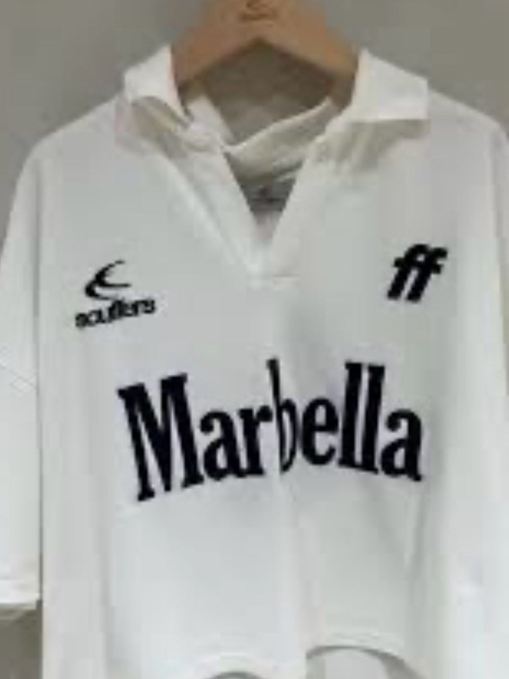 Marbella Logo Graphic Polo - White with Black Text